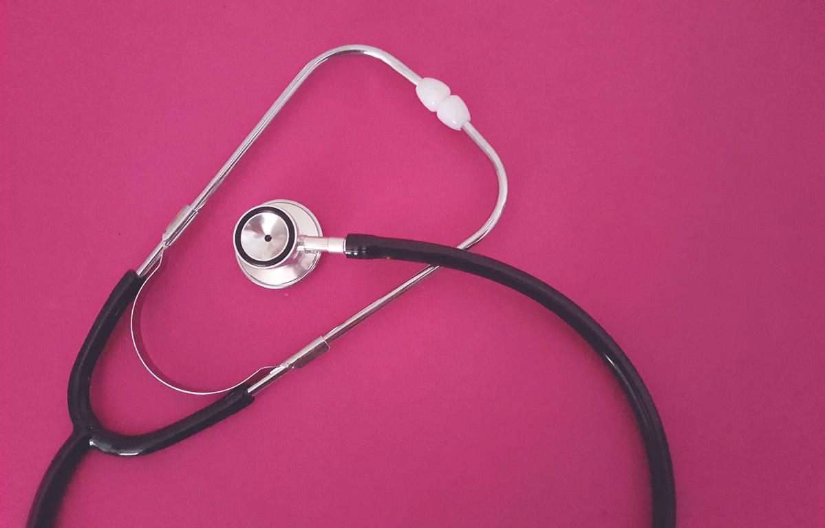Stethoscope on a pink background