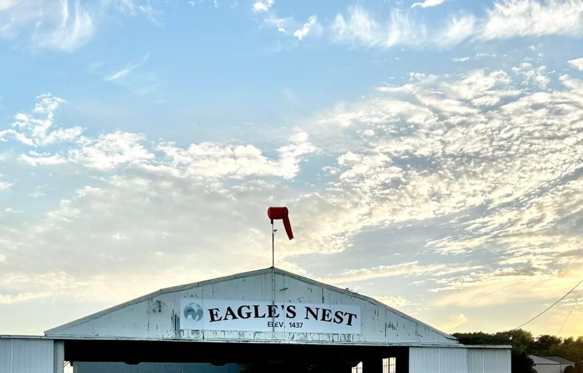 Eagle's Nest Airport in front of a sunset