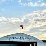 Eagle's Nest Airport in front of a sunset