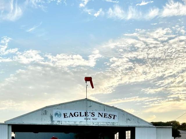 Eagle's Nest Airport in front of a sunset