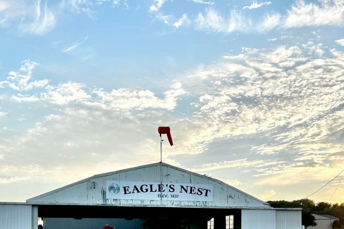 Eagle's Nest Airport in front of a sunset
