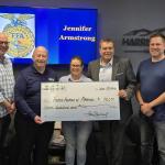 Harrisonburg Media Group and WSIG present Virginia FFA with a check.