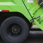 Up close of a trash truck's tires.