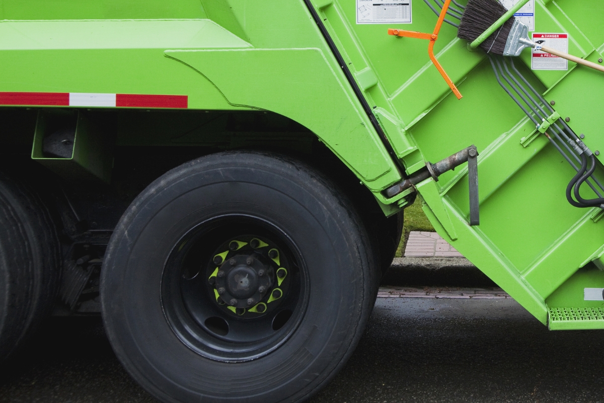 Up close of a trash truck's tires.