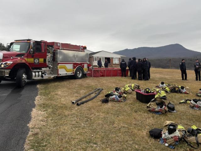 Rockingham County Fire officials practicing extinguishing fires.