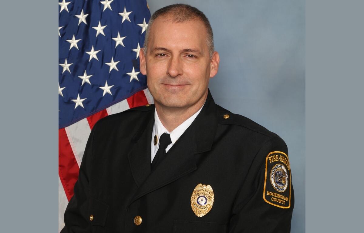 Headshot of Captain Dennis Albertson.