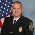 Headshot of Captain Dennis Albertson.