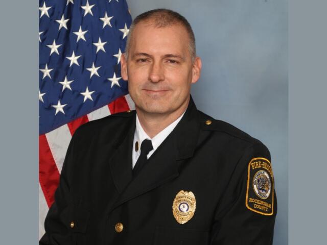 Headshot of Captain Dennis Albertson.