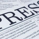 Press on a newspaper