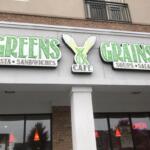 greens & grains sign