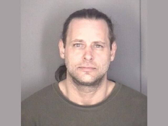 Mugshot of Evan Smyres.