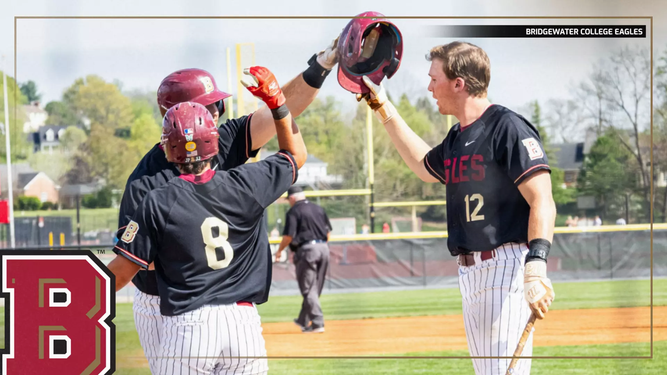 Baseball players in black jerseys celebrate with a high-five on the field, Bridgewater College Eagles logo visible in the scene.