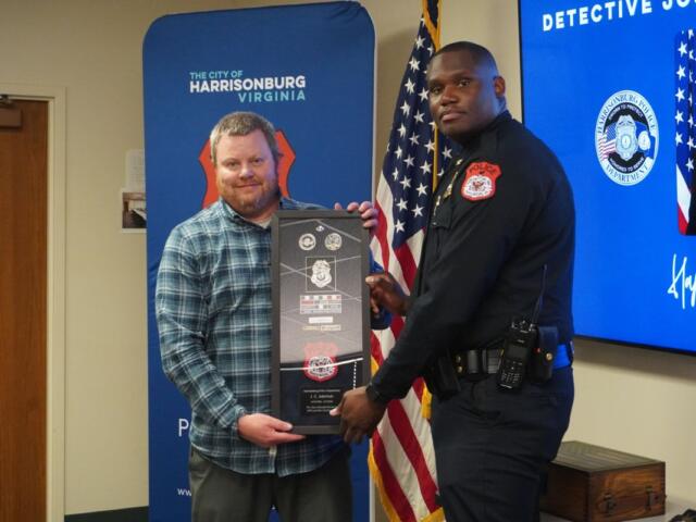 Detective J.C. Aderholz (left) and HPD Police Chief Joe Tucker (right)