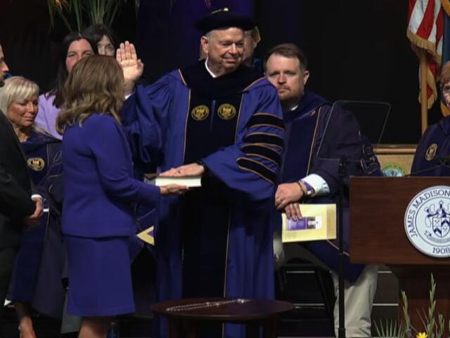 JMU President Schmidt being sworn in as the seventh JMU preisdent