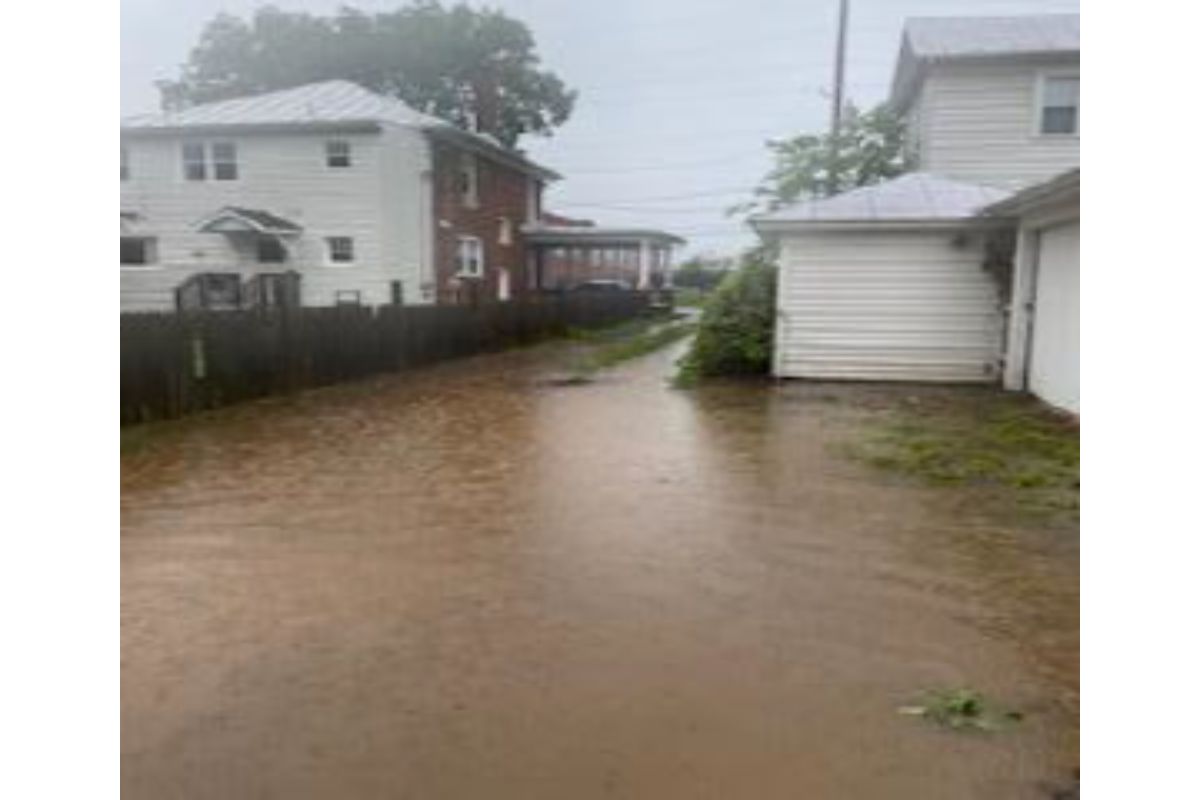 Photo of flood water along residence on E. Elizabeth St.