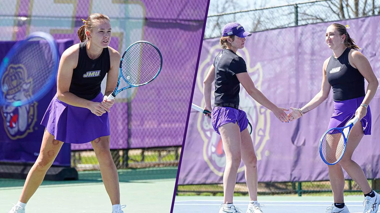 Two female tennis players in purple skirts shake hands on a court after a match, wearing black tops and matching purple accents.