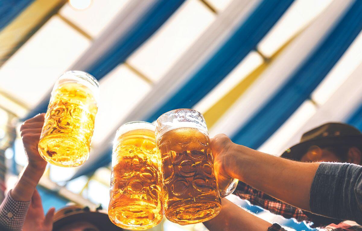 People making a toast with beers