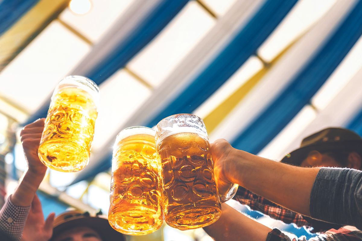 People making a toast with beers