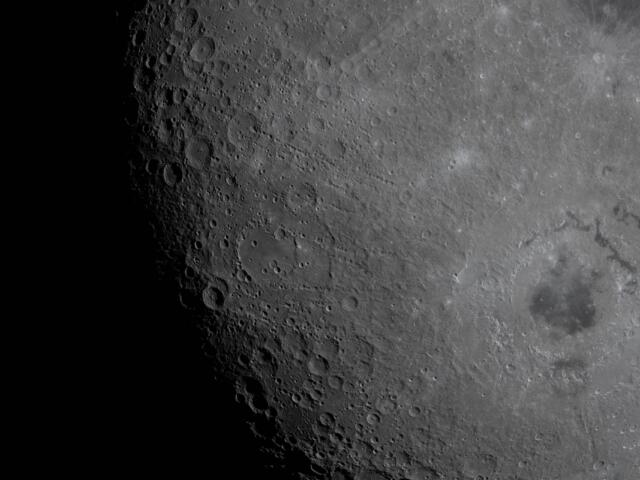 A view of the moon with the Carroll Crater.