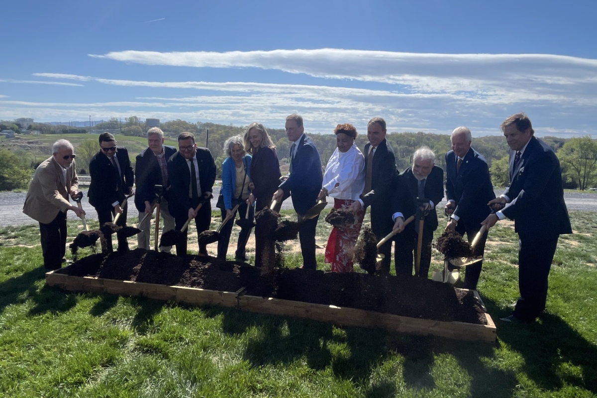 Officials dig the dirt at the official I-81 widening site in Harrisonburg.