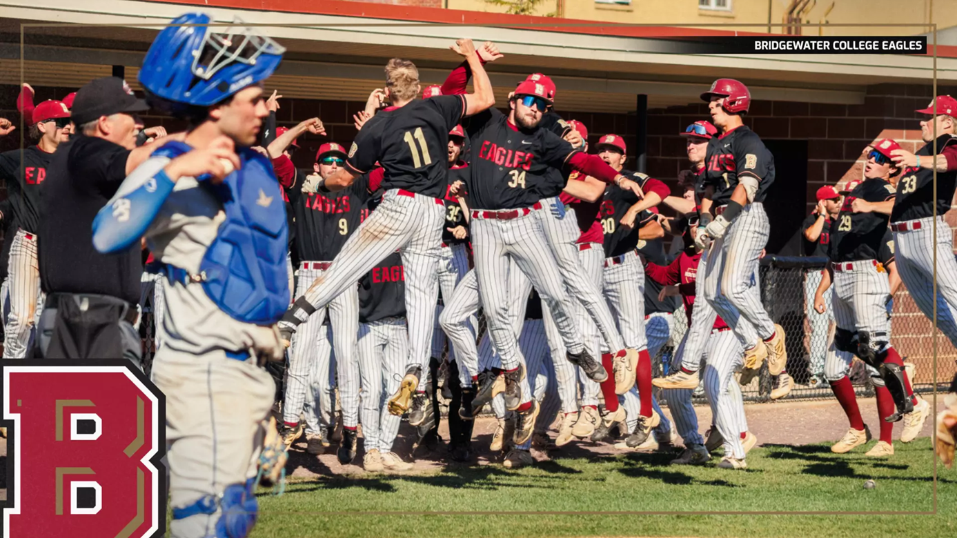 Bridgewater College Eagles baseball team celebrating on the field, players in black jerseys jumping with arms raised after a win.