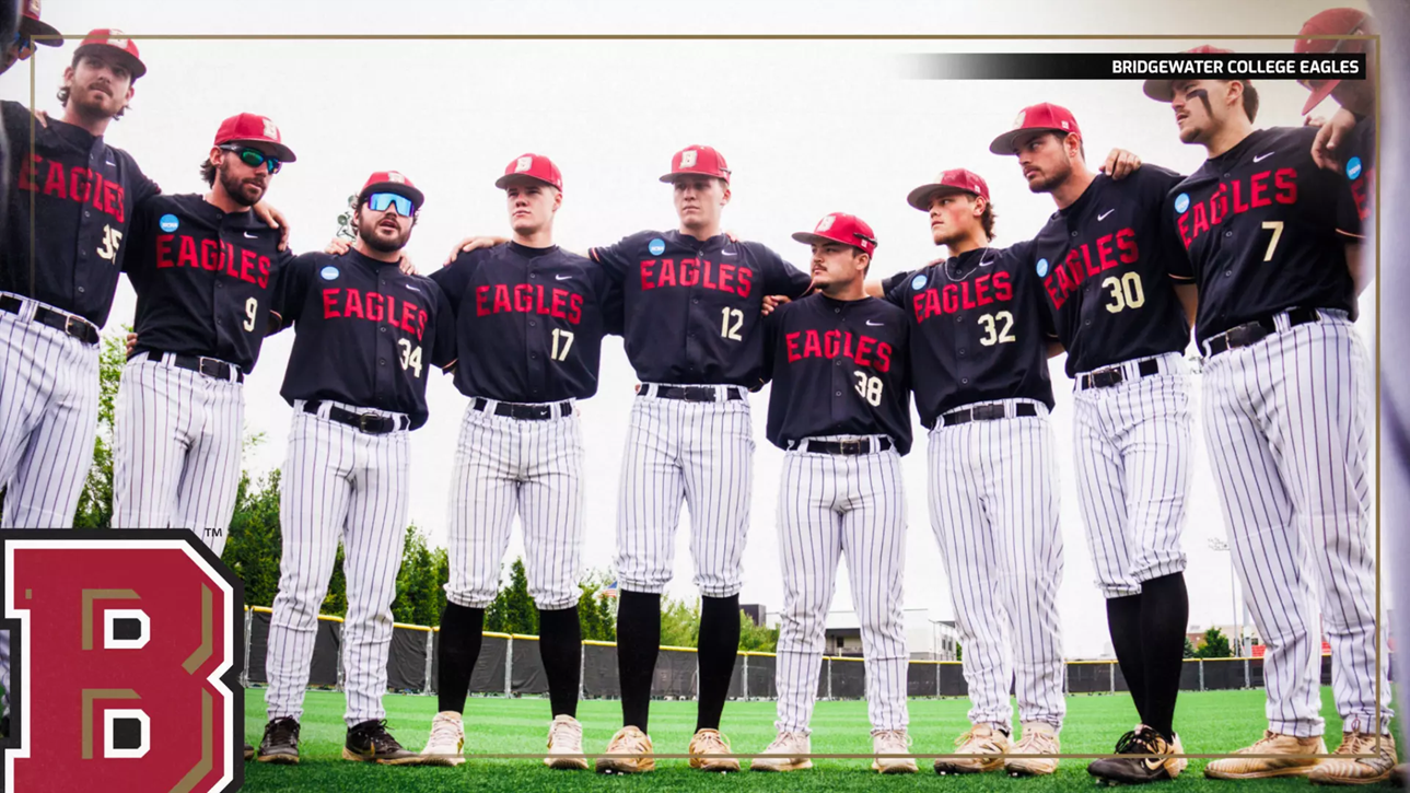 Bridgewater College Eagles baseball team stands in a line with arms around each other on the field, wearing black jerseys and pinstripe pants.