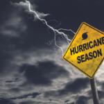 Hurricane season sign with storm clouds in the background