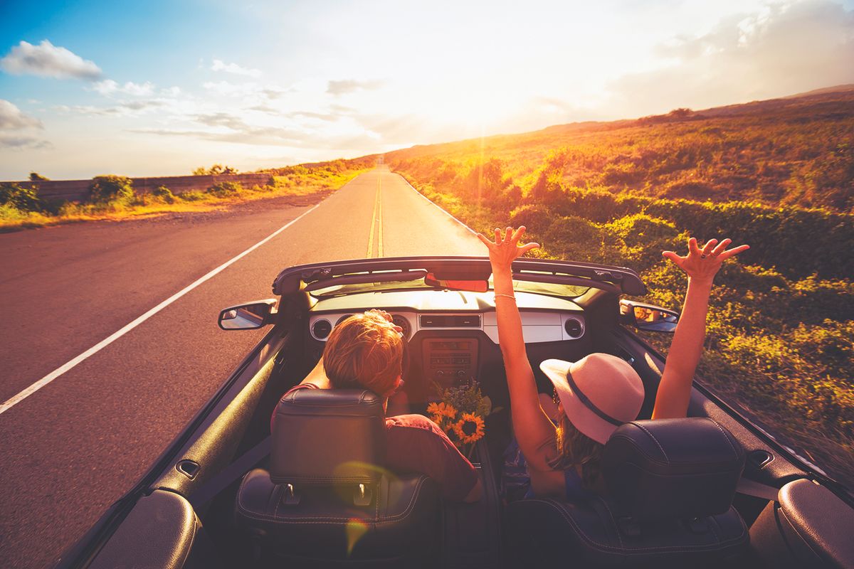 Driving with a sunset in the background