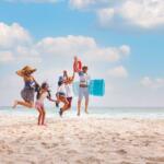 Family of four on the beach