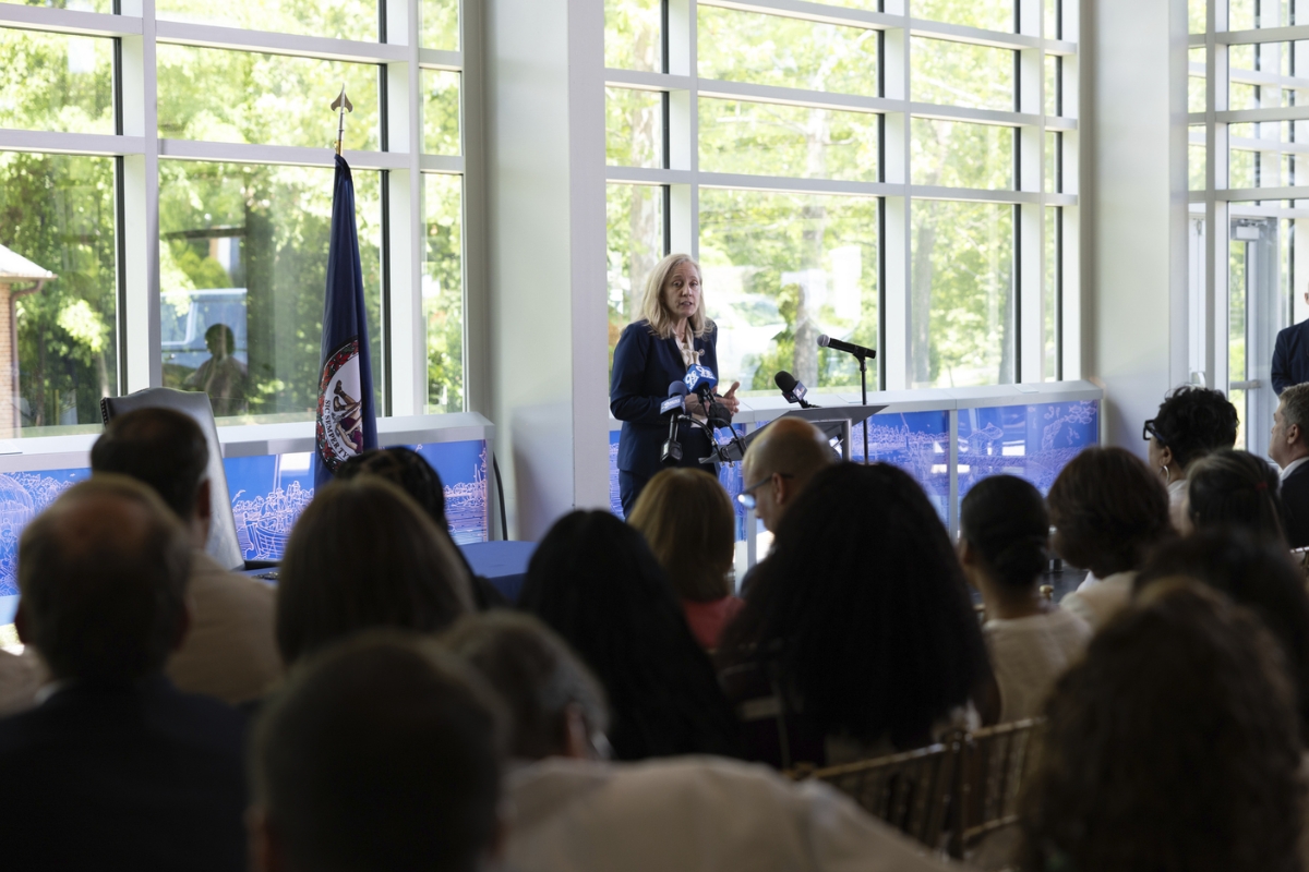 Governor Abigail Spanberger stands at a podium