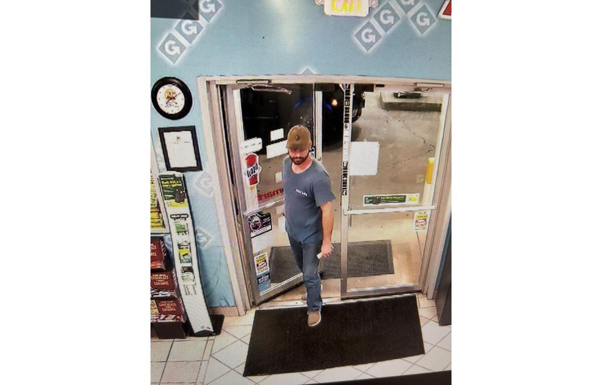 Man entering a gas station