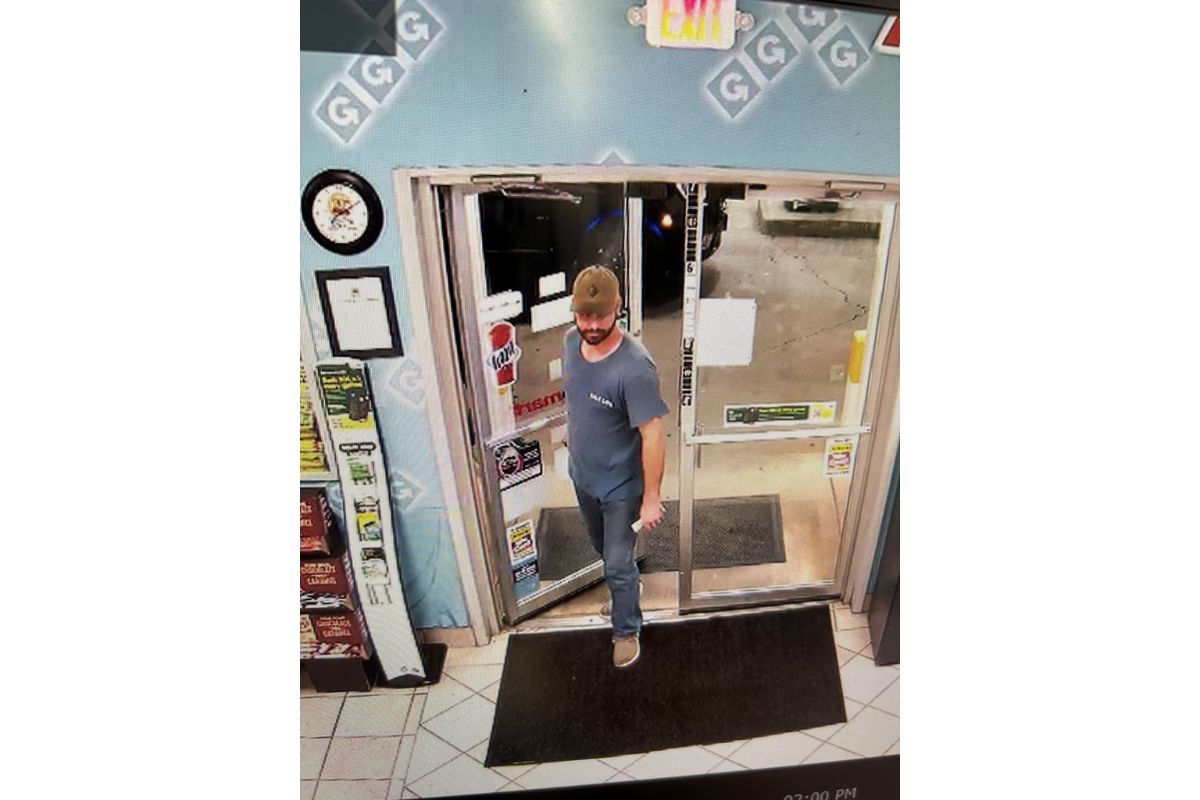 Man entering a gas station