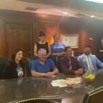 Senator Tim Kaine sits with United Way of the Central Shenandoah Valley board members and employees.