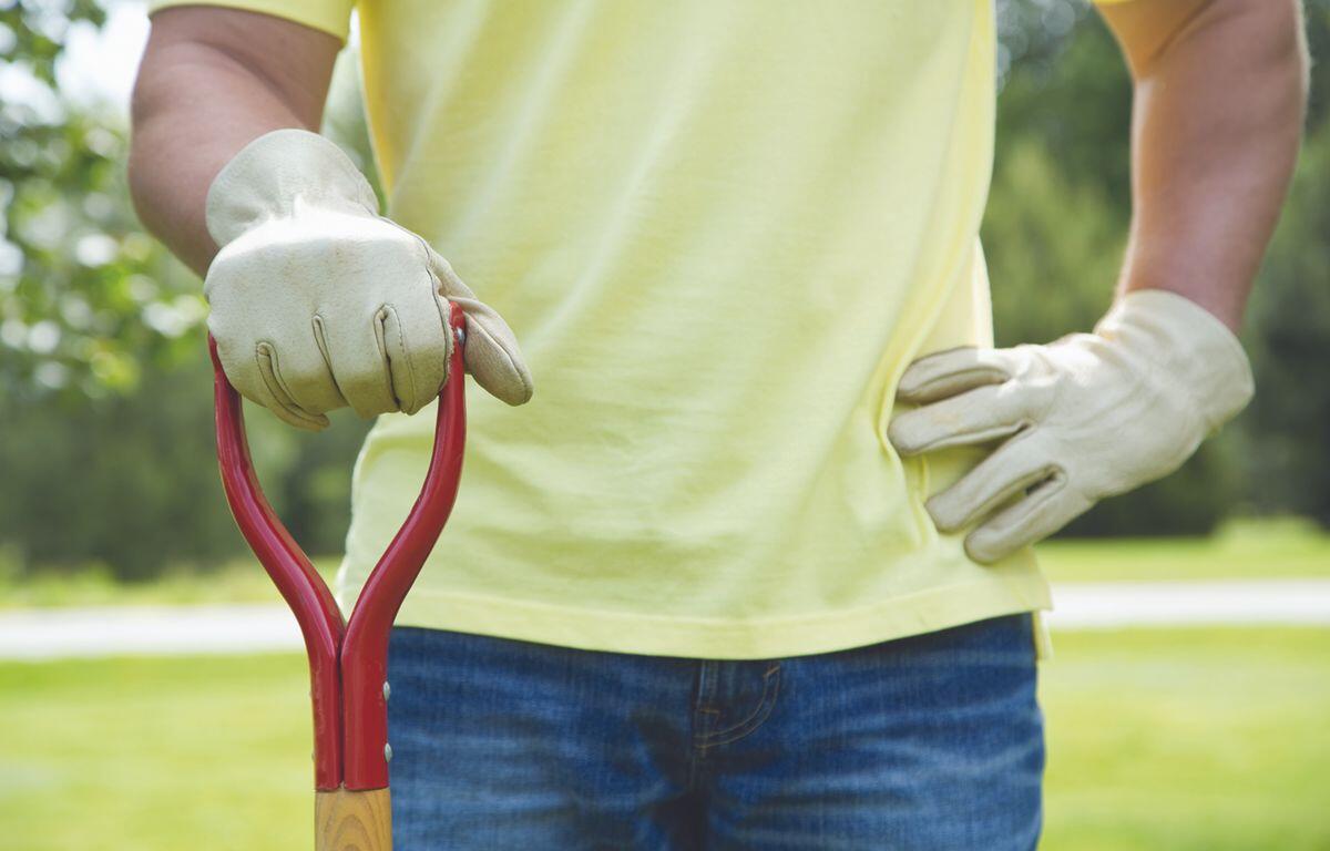 Man holding a shovel