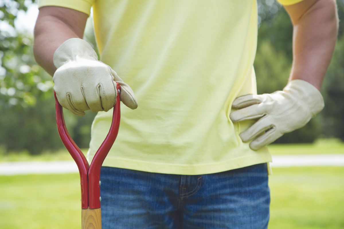 Man holding a shovel