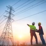 Workers looking at power lines