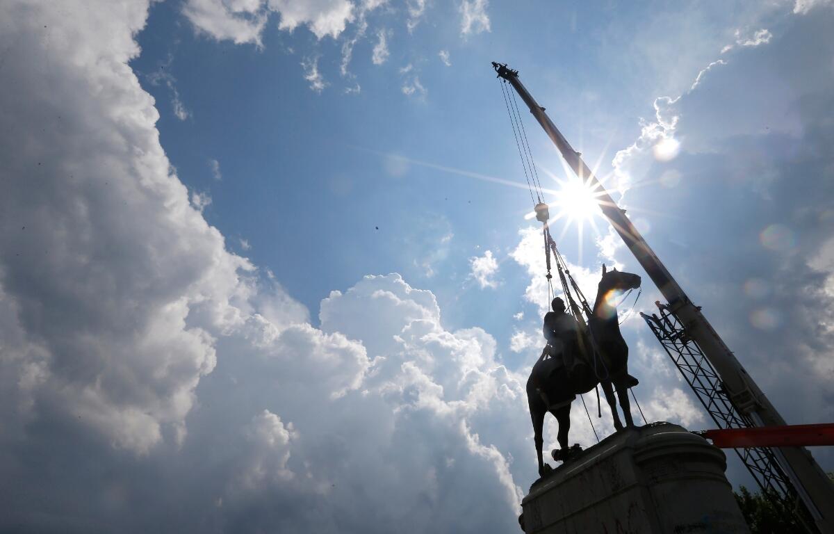 A crew removes the statue of Confederate Gen. Stonewall Jackson, July 1, 2020, in Richmond, Va.