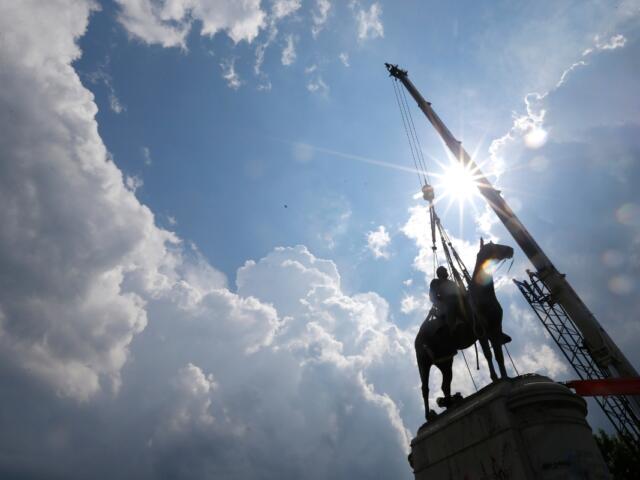 A crew removes the statue of Confederate Gen. Stonewall Jackson, July 1, 2020, in Richmond, Va.