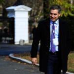 Jim Acosta walking on the North Lawn driveway upon returning back to the White House in Washington, Friday, November 16, 2018.