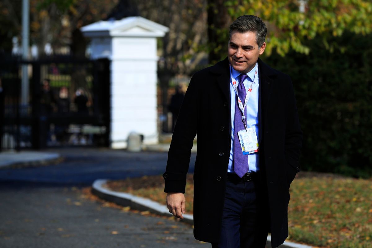 Jim Acosta walking on the North Lawn driveway upon returning back to the White House in Washington, Friday, November 16, 2018.