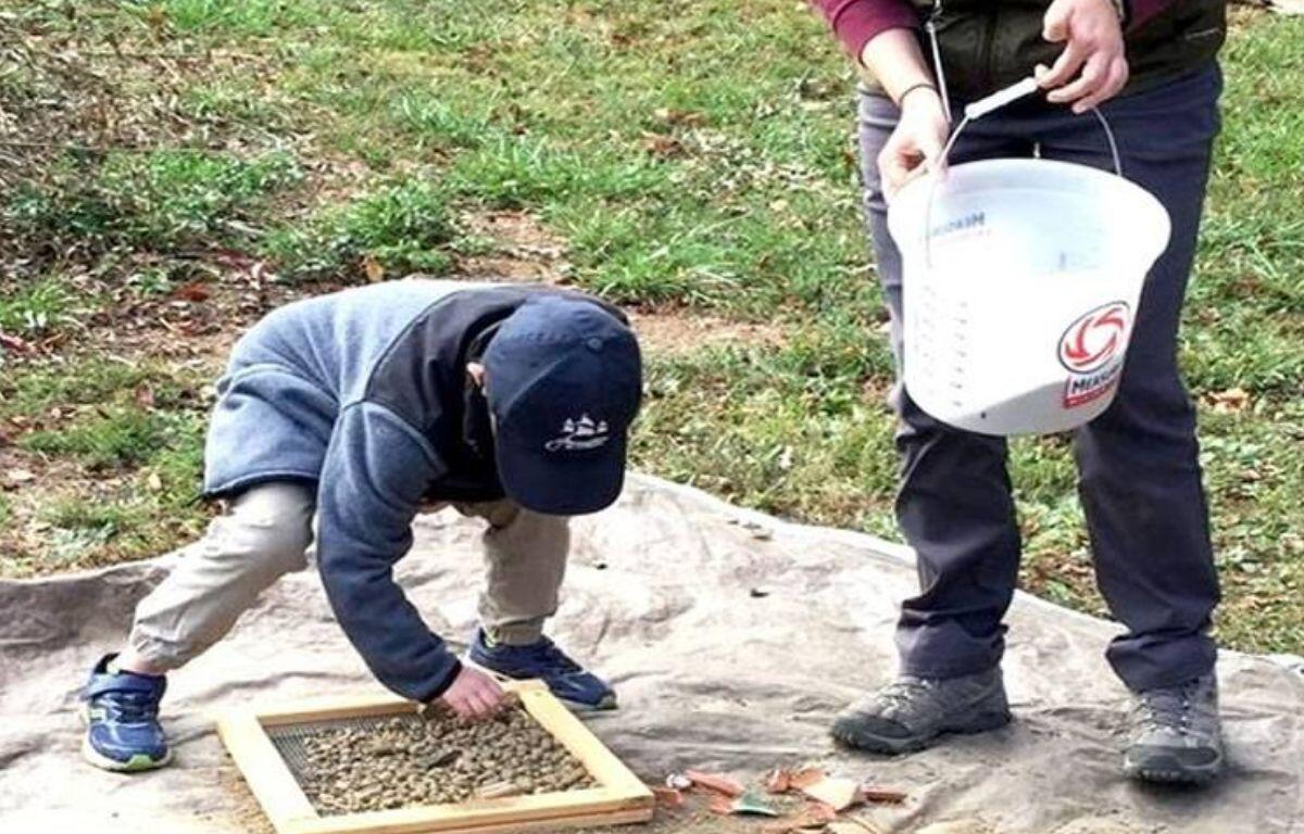 Child participating in International Archaeology Day