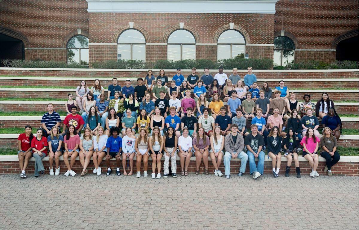 First-year students gather for a group photo at Thomas Plaza during orientation weekend.