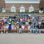 First-year students gather for a group photo at Thomas Plaza during orientation weekend.