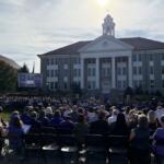 JMU President Jim Schmidt outside of Wilson Hall with a crowd